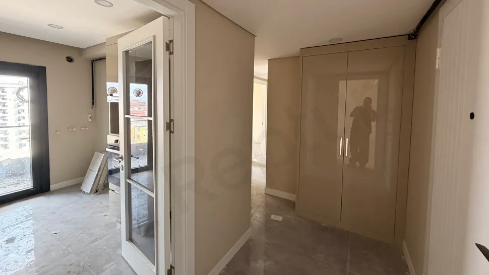 Bright and spacious hallway view of a modern residence apartment located in Pendik, Istanbul.