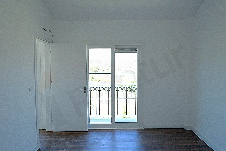 Image of a bright and spacious bedroom.