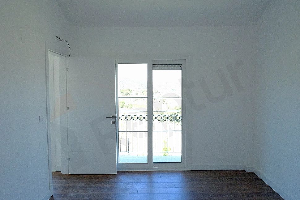 Image of a bright and spacious bedroom.