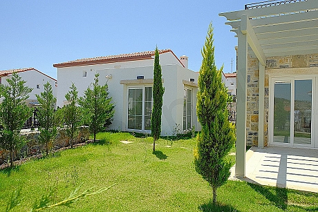 Garden view of a villa for sale in Bodrum.