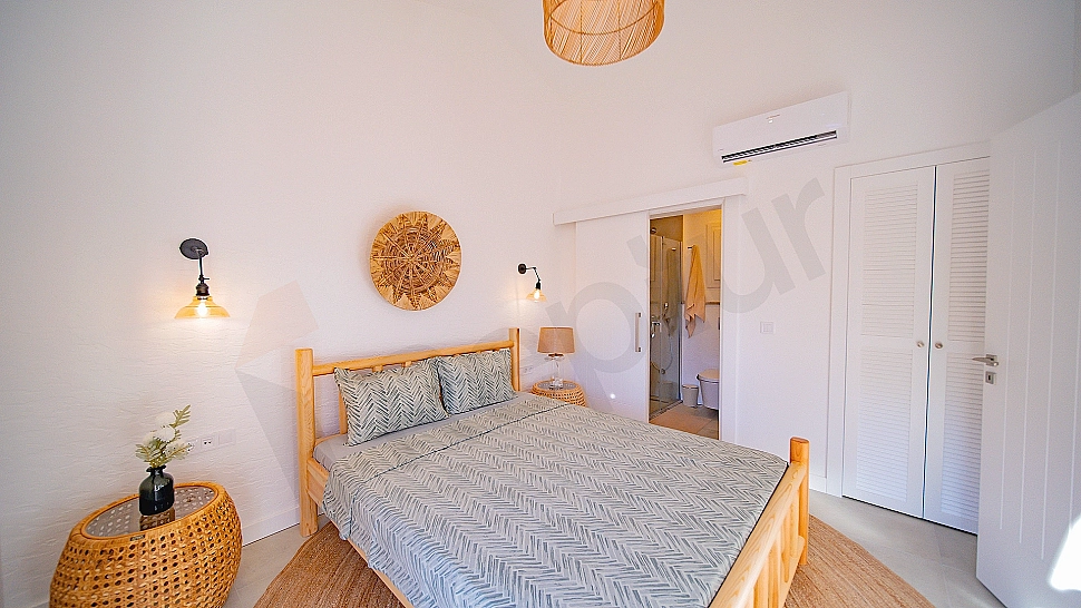 Image of a bright and spacious bedroom.