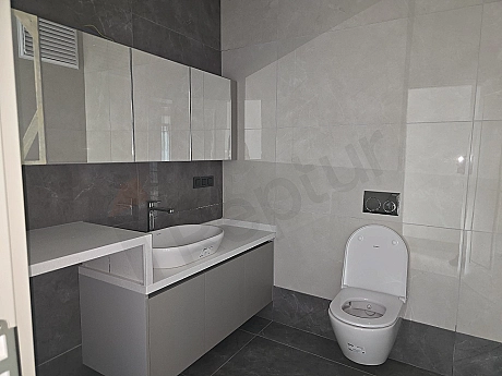 Modern designed, bright and spacious bathroom.