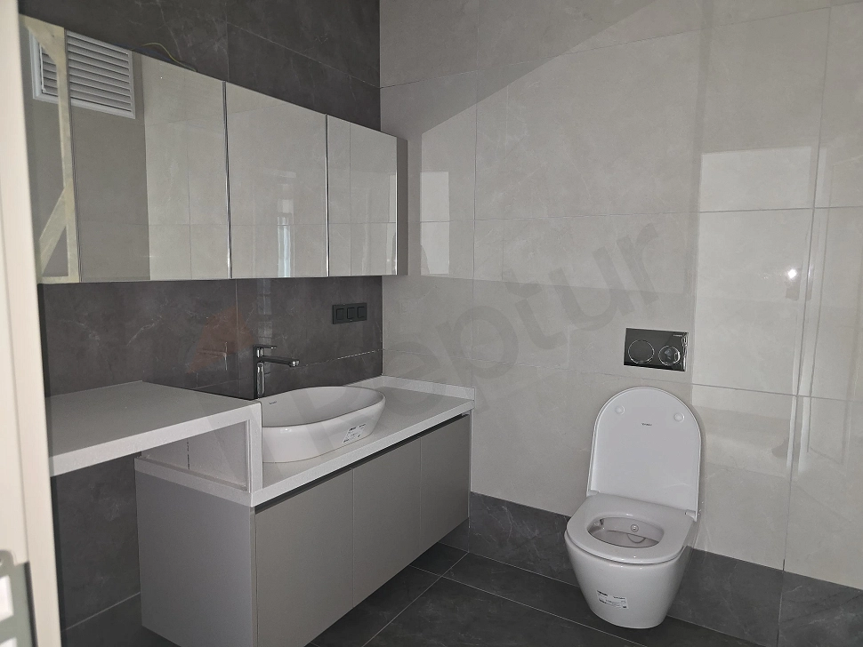 Modern designed, bright and spacious bathroom.