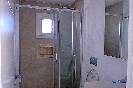 Modern designed, bright and spacious bathroom.