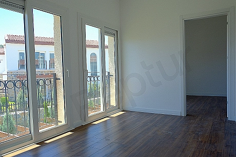 Image of a bright and spacious bedroom.