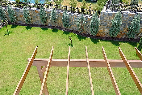 Photo of villa with a large garden.