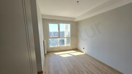 Interior view of a spacious and modern bedroom in a 4+1 apartment in Beylikdüzü, Istanbul.