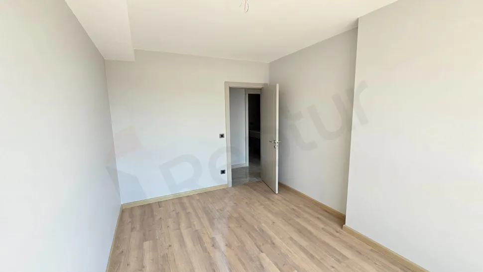 Interior view of a modern and spacious bedroom in Beylikdüzü