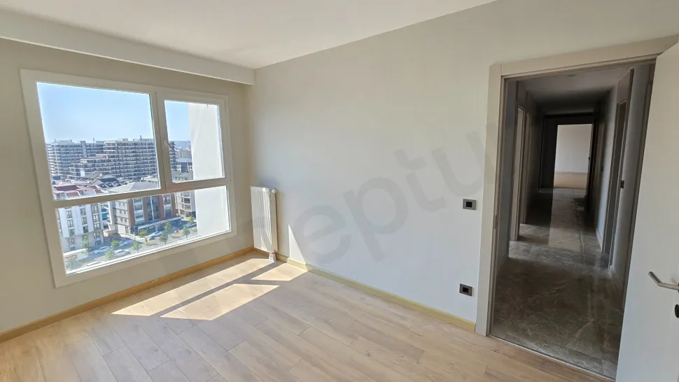 Modernly designed, spacious and bright bedroom view.