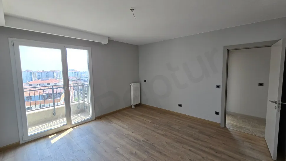 Modern designed, spacious and bright bedroom view.