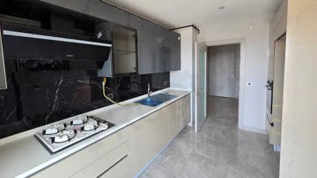 Kitchen area design of a modern and spacious apartment.