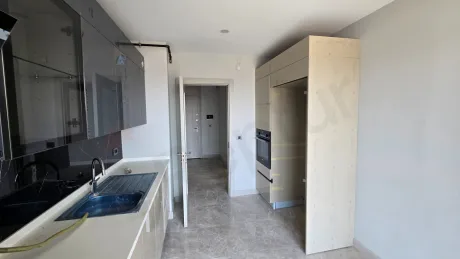 Modern and spacious kitchen area of a 3+1 apartment located in Beylikduzu, Istanbul.