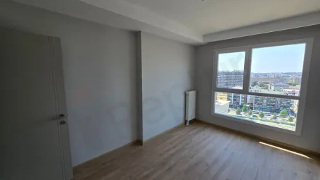 A modern designed, spacious and airy bedroom view.