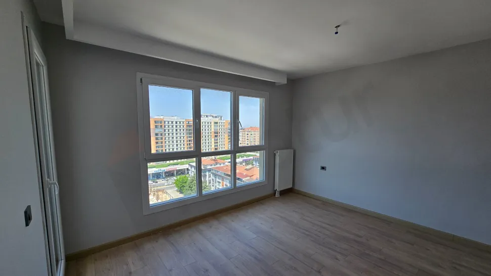 Image of a spacious and modernly designed bedroom in a new project located in Beylikdüzü, Istanbul.