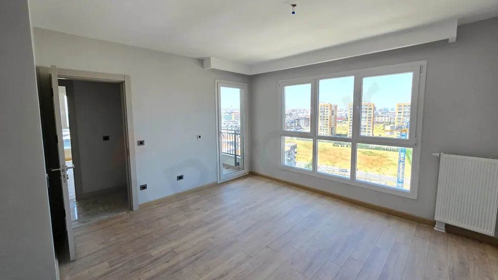 Interior view of a modern and spacious bedroom.