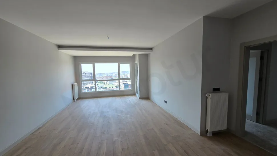 Spacious and bright living room area of the modern apartment for sale in Beylikdüzü.