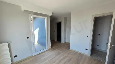 Modern and spacious bedroom interior view.