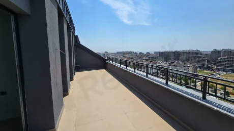 Terrace of a modern and spacious duplex apartment with city views in Beylikdüzü, Istanbul.