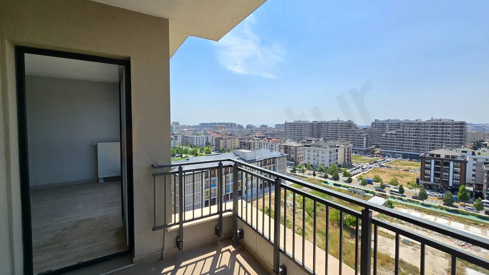 Spacious and airy balcony of a modern duplex apartment with a city view.