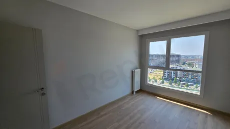 Interior view of a spacious and modern bedroom.
