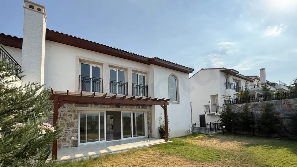 Exterior view of a 3+1 detached villa with modern architectural design.