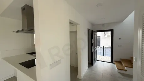 Entrance door and hallway area of a modern villa residence.