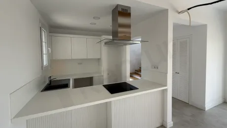 Spacious and bright kitchen area design of a modern villa for sale in Bodrum.