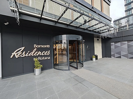 24/7 controlled security entrance gate of a modern residence building.