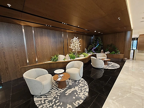 Modern and spacious entrance lobby of a luxury residence building.