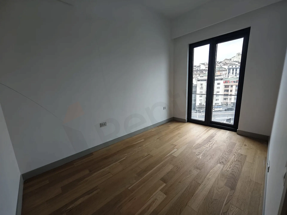 Modern and spacious bedroom of a luxury residence apartment in Sisli.
