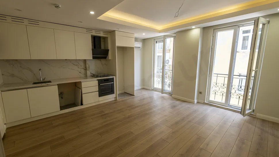 Spacious and bright dining room area of a modern apartment.