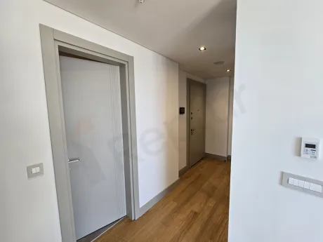 View of a spacious and bright corridor in a modern residential project.
