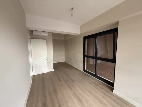 Bright and spacious bedroom view of a modern 3+1 apartment.