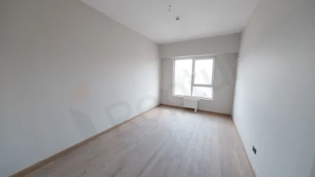 Interior view of a modern and spacious bedroom.