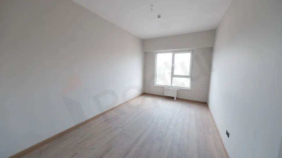 Interior view of a modern and spacious bedroom.