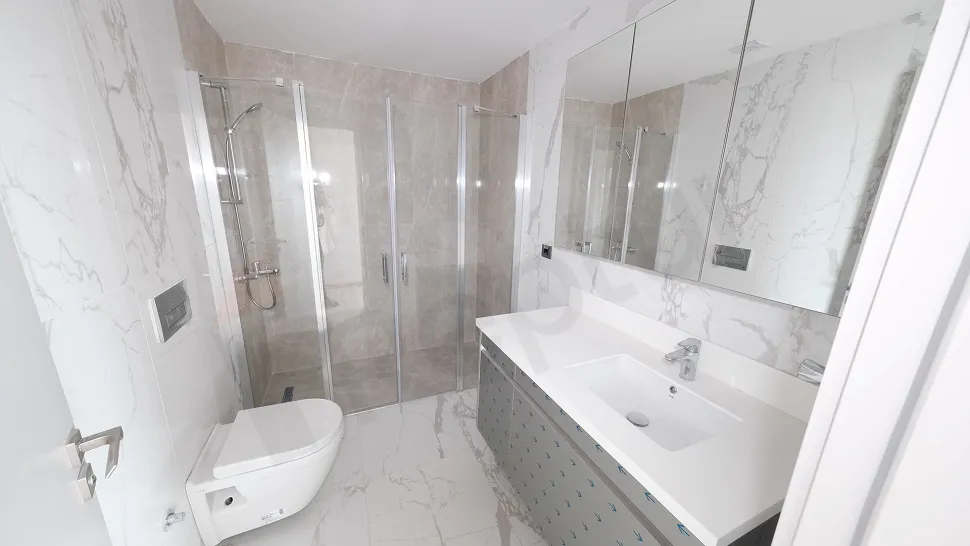 Modern and stylishly designed, spacious bathroom interior.