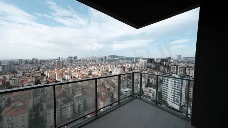 Spacious balcony of an apartment with sea and city views in Kartal, Istanbul.