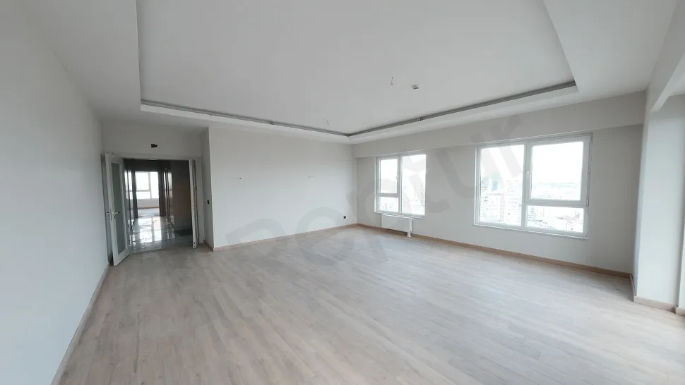 Spacious and bright living room of a modern apartment in Kartal with natural light.