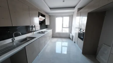 Modern and spacious bathroom interior featuring stylish ceramic tiles and elegant fixtures.
