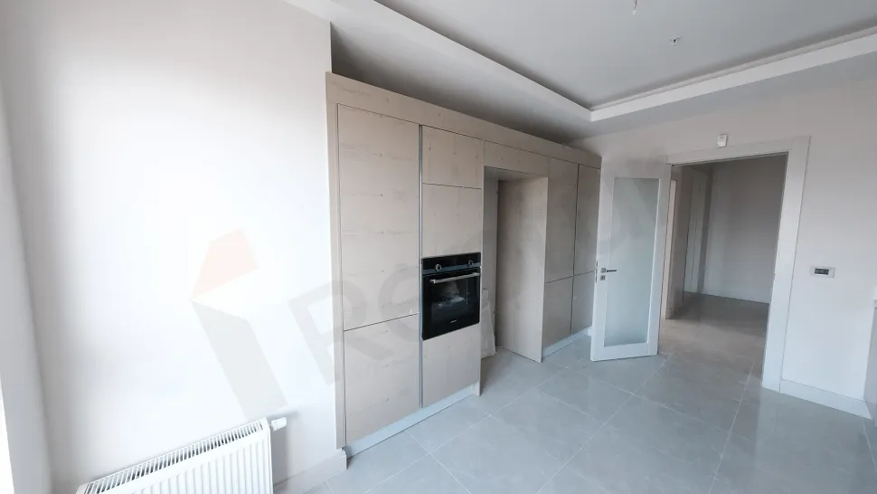 Spacious and modernly designed kitchen area.