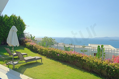 Carefully landscaped green garden and outdoor area of a luxury villa in Bodrum.