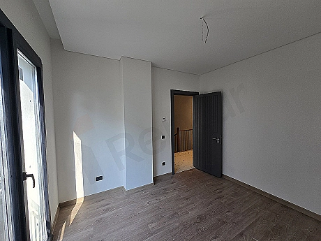 Image of a bright and modern bedroom.