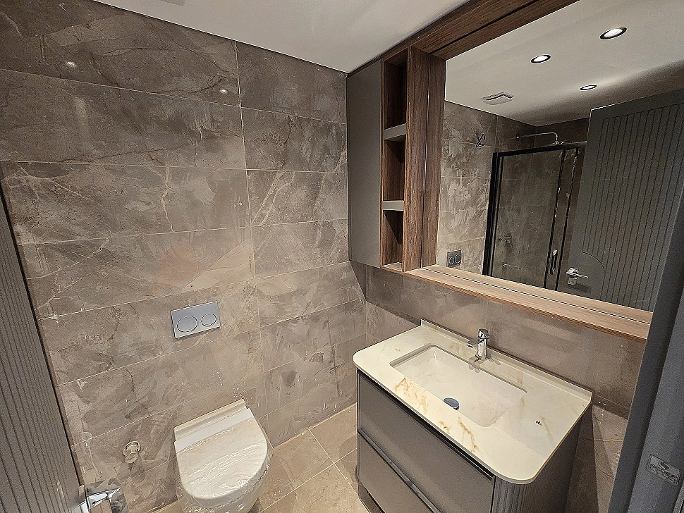 Bright and spacious villa bathroom interior with modern design.