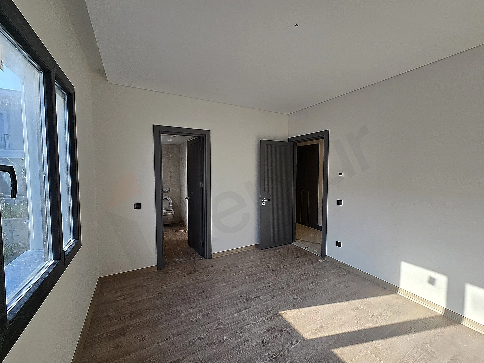 Image of a bright and spacious bedroom.