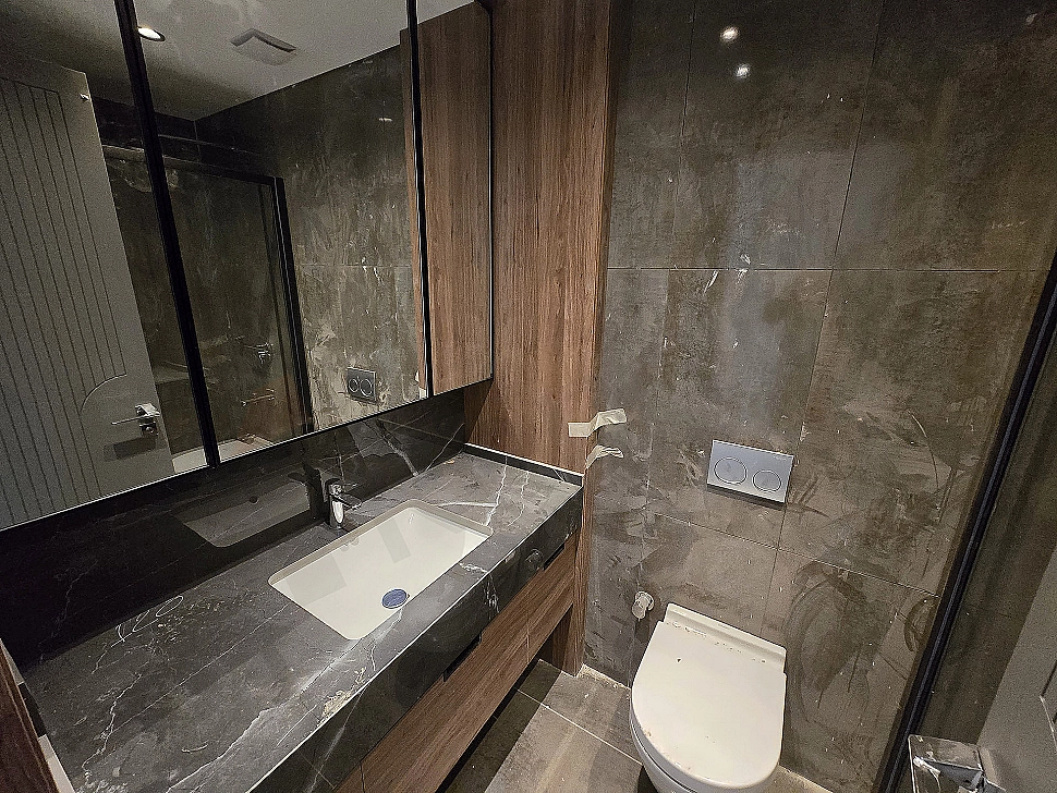 Bright and spacious modern bathroom interior design.