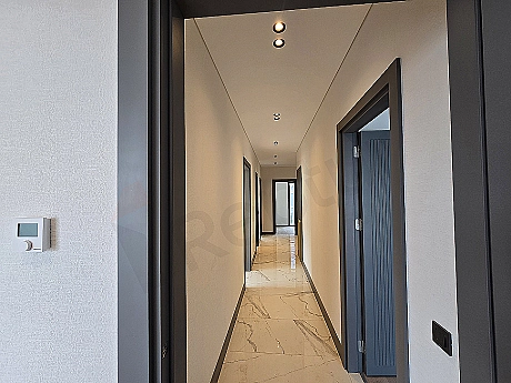 Interior view of a corridor in a villa for sale in Başakşehir.