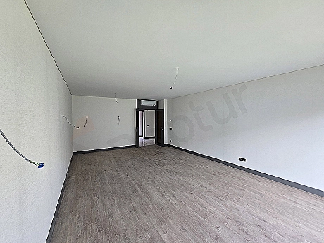 Image of a bright and spacious living room interior.