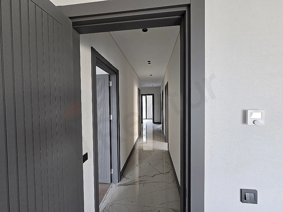 Interior photo of a hallway in a villa for sale in Başakşehir.