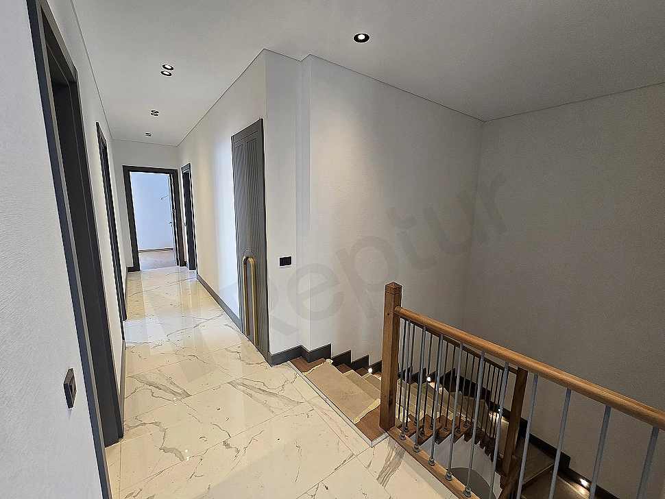 Corridor view of an unfurnished villa for sale in Başakşehir.