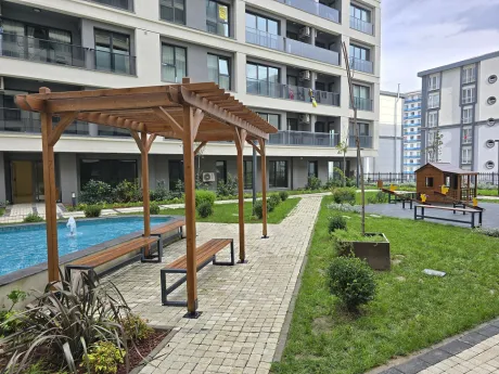Modern and safe children's playground area located within the residential complex